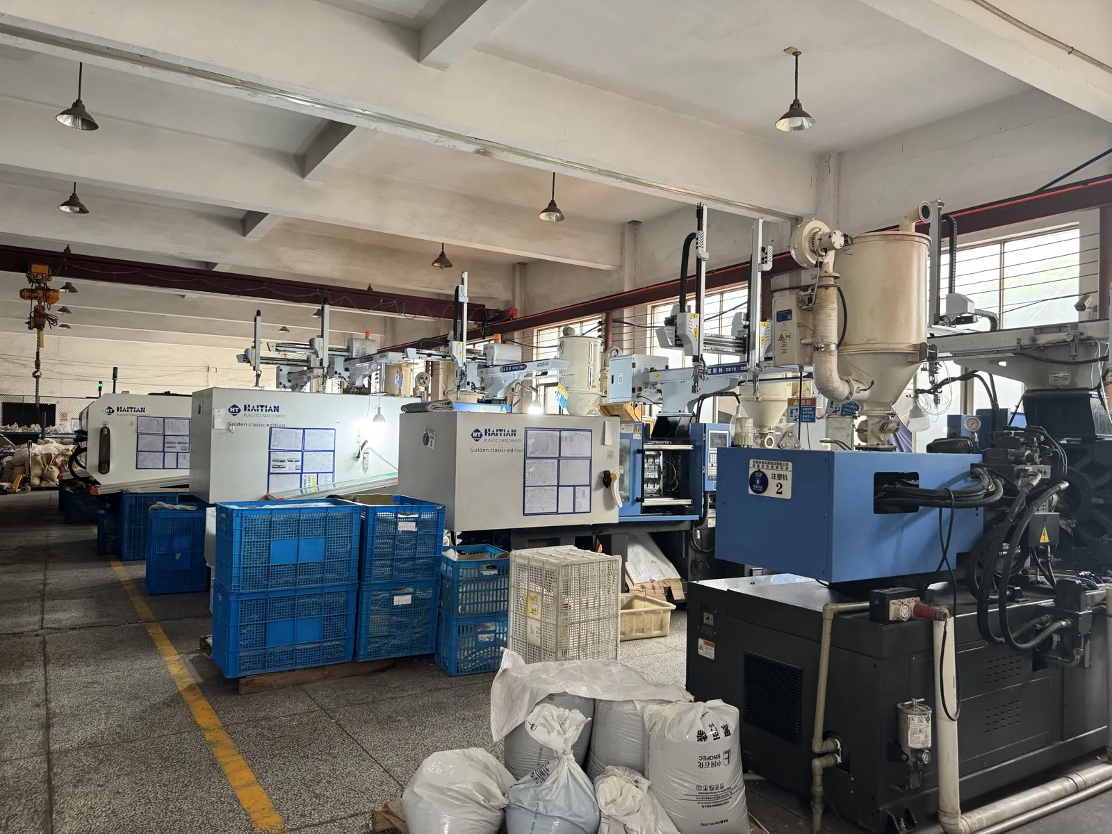 Injection molding machines producing plastic scooter components